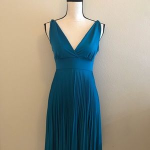 pleated blue flowy dress